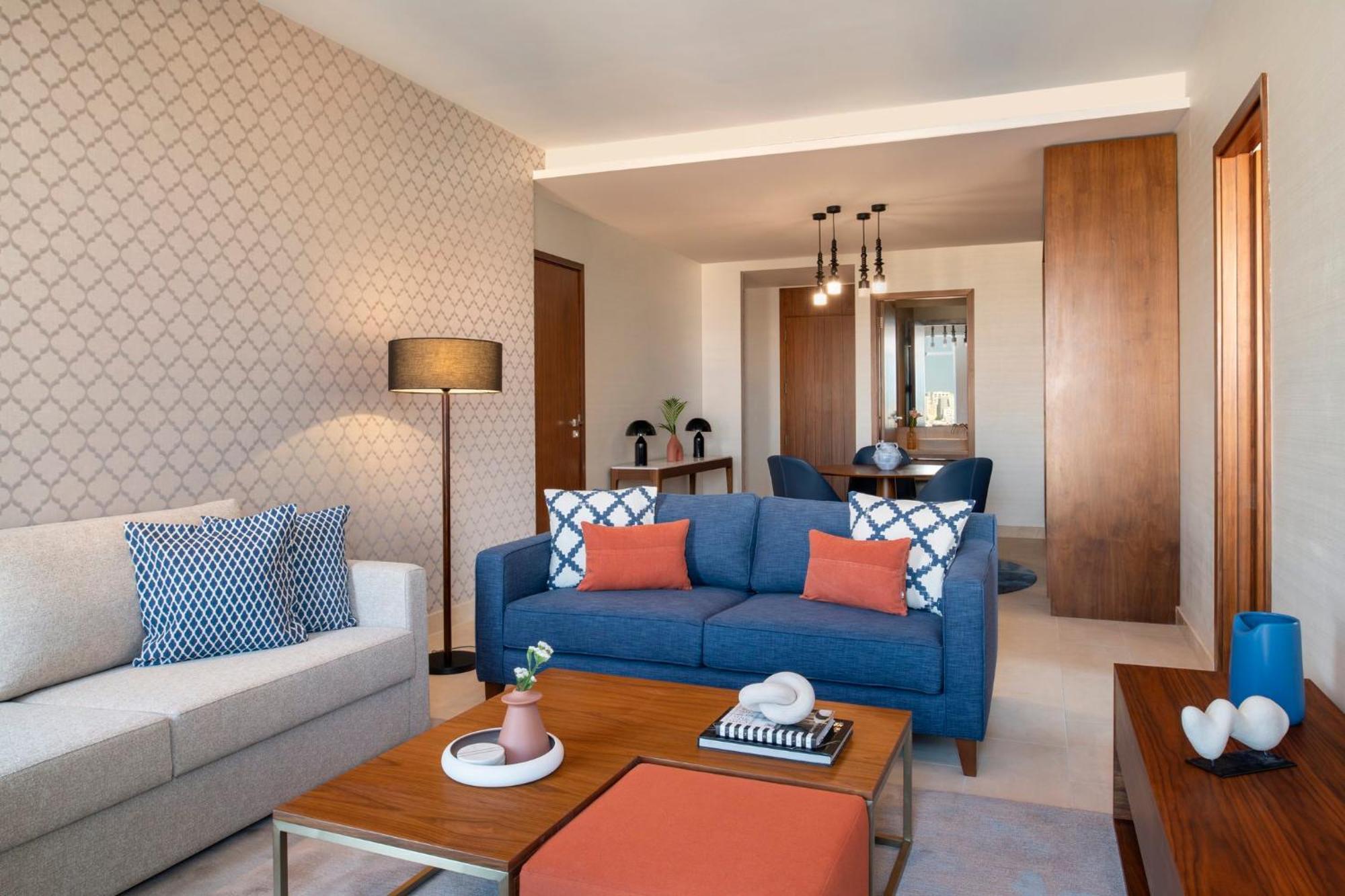 Abesq Doha Hotel And Residences, An Ihg Hotel Экстерьер фото A living room at the hotel
